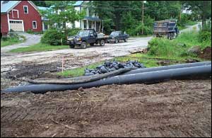 pipes in a pile of dirt