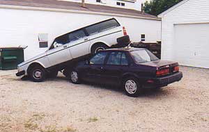 a car on top of another car