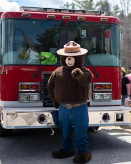 Open House with Smokey the Bear infront of the Antrim Fire truck