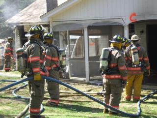 Firefighters at live burn training