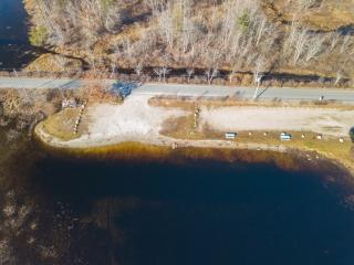 Aerial Image of sandy parking area and boat launch  by Gregg Lake, freshwater lake